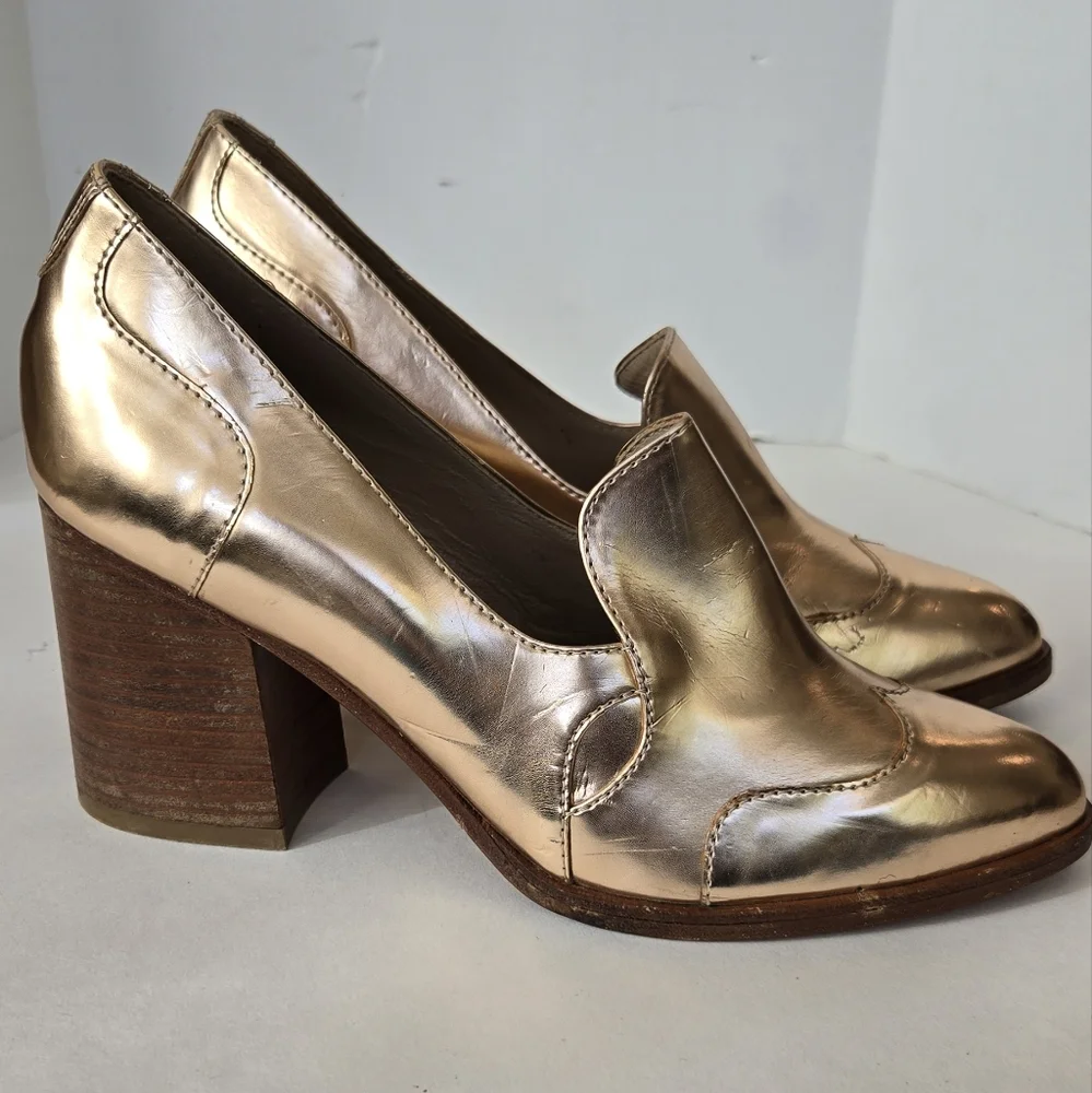 The office of Angela Scot Elegant Rose Gold Metallic Heels